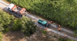 Piste cyclable en béton compacté routier (BCR) avec 100 % de gravillons et de sable recyclés